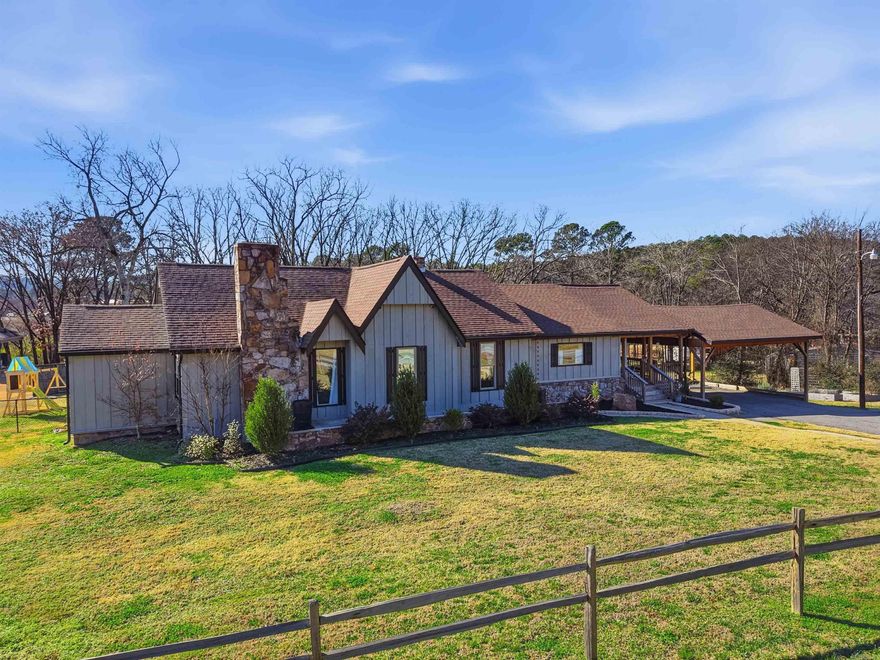 This property is a perfect blend of modern convenience and serenity - without being a "cookie cutter" style. Strategically located near Cantrell and Pinnacle Mountain - this fully fenced, gated home is a little under an acre with no HOA, perfect for a commute but spacious enough to never leave the house. There is a gorgeous kitchen with plenty of counter space, a deck, dedicated garden, covered parking, a primary bedroom with it's own hearth space and expansive walk in closet. The center bedroom was previously used as a media room with a projector screen. The common areas have an airy open concept with high vaulted ceilings - and with four bathrooms you never have to worry about sharing! Reach out to schedule your private showing.