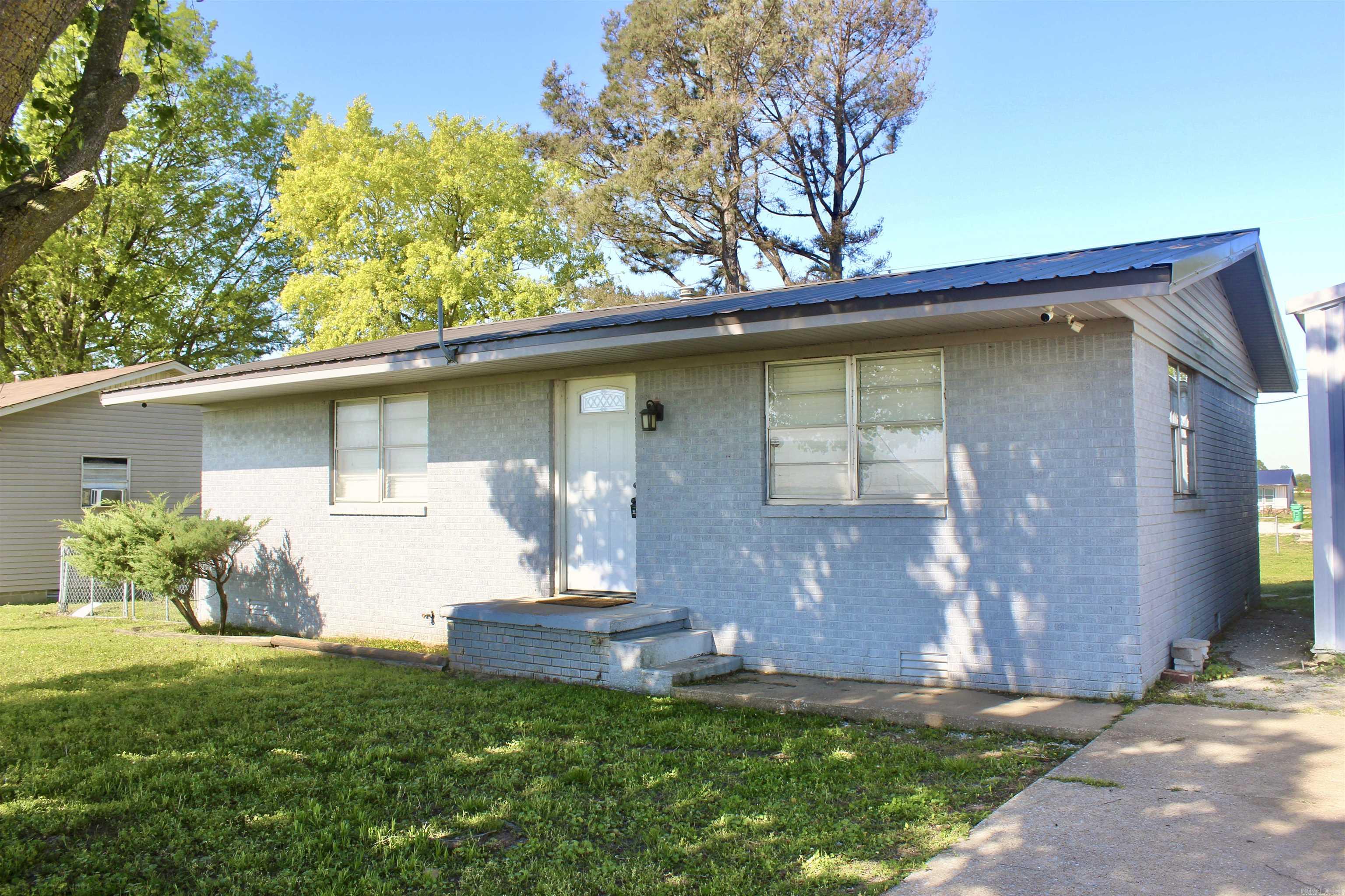 Just listed ā 312 S Crossroads, Portia! This beautifully remodeled brick home in Portia, Arkansas, is move-in ready and full of charm. Featuring a durable metal roof, the home offers a bright, inviting interior with a spacious living area, updated kitchen, and comfortable bedroomsāall with neutral finishes to match any style. Outside, enjoy a fully fenced backyard perfect for pets, play, or relaxation, along with a detached 1-car garage/shop ideal for storage or a workspace. Located less than half a mile from Highway 63, this home provides easy access to local amenities while maintaining a peaceful, small-town feel. Whether you're a first-time buyer, downsizing, investing, or simply looking for a low-maintenance home, this property is a perfect fit. Donāt miss your chance to own this adorable and versatile homeāschedule a showing today!