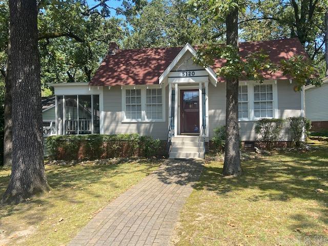 One of a kind home in historic Hillcrest w/modern studio in back w/rental income. Two separate dwelling units that total 3/2 w/1423 SF. Only two owners since it was built to last in 1930's. Main house smartly updated to preserve hardwood floors. Recently upgraded Central A/C with filtering system. Kitchen has modern appliances w/ a charming, windowed breakfast alcove/or office area. Roomy laundry/utility in enclosed back porch. Retractable stairs lead to floored attic storage. Additional storage in dry-sealed crawl space. Incredibly versatile studio is a tour-de-force of efficiency and comfort designed by local architects. Full bath, has huge tub/separate shower. Spacious main sitting room w/bright windows all around w/compact kitchen and dining table during the day. At night, a handcrafted queen-sized Murphey bed converts it into a luxurious bedroom. Separate TV/reading room. Fenced backyard separates studio and main house. Dbl parking pad off alley in back. Screened front/side porch w/mature Oak trees in front and back define this as a classic Hillcrest gem. Furnishings shown are available for continued rental or immediate move in. (price negotiable) SEE AGENT REMARKS