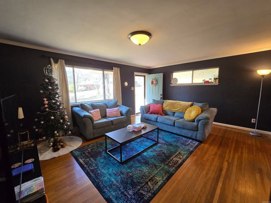 Newly listed well-loved brick home is full of charm offering abundant space in every room and closet in a cozy, inviting home. This 3-bedroom, 1.5-bath ranch-style home features approximately 1,500 sq ft and is tucked away on a quiet cul-de-sac. Enjoy the convenience of a prime location minutes from Midtown shopping, CHI St. Vincent, UAMS, Interstate access, and the newly name Hall High Charter School. Meticulously maintained, the home boasts a NEW roof, hot water heater, and newer AC system. The open kitchen, dining and great room create an ideal space for everyday living and entertaining, enhanced by plentiful natural sunlight. A double carport provides ample guest parking. Original hardwood floors add character, while the generously sized laundry/utility room & the extra space off the dining area offers an office/ flex or family room. All closets are spacious and the remodeled kitchen and bathrooms leaves less to be done to make this home your private retreat. Step outside to a private, fenced backyard featuring a patio, maintainable yard, ready for an oasis makeover. Ring alarm system conveys; refrigerator is negotiable. Experience a country feel in the city! See Agent Remarks!