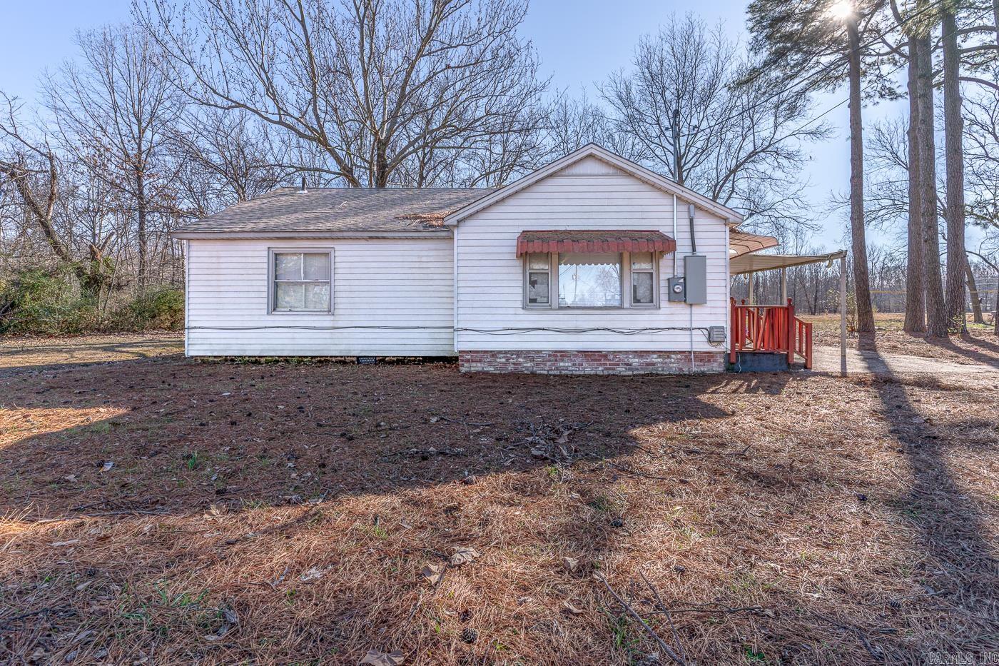 Investment Opportunity! Welcome to Market 800 Warren St. Jonesboro, AR located in the Jonesboro School District. Situated on . 21 +/- acres, this home offers 1,340 square feet of well-designed living space. It features 3 bedrooms and 1 full bathroom. The living area includes a spacious space that leads into a dining area connected to the kitchen. From the kitchen you will find a large bedroom, and then through the dining area you will find 2 additional bedrooms and a full bathroom. On the outside of the home features a 1 car carport, a large storage building, and a chain link fenced back yard. Call today to add this home to your rental portfolio.