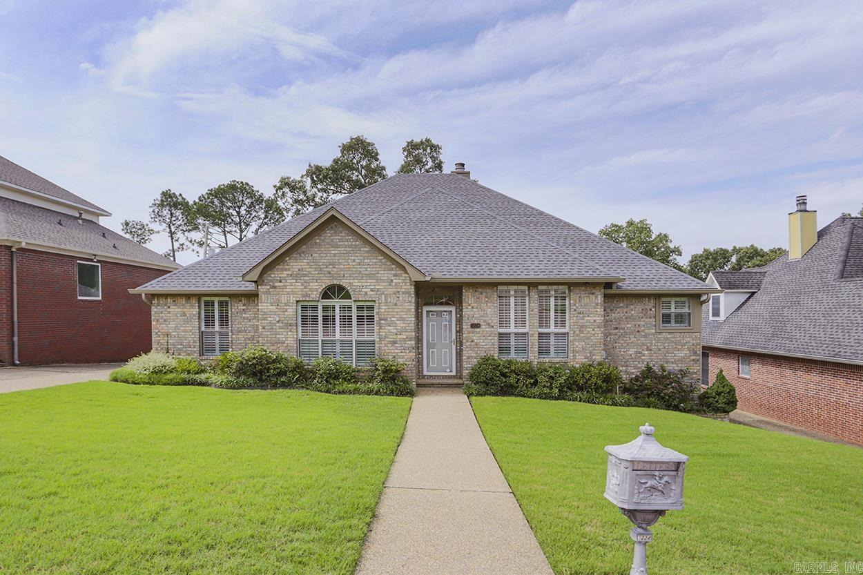 Lovely custom patio home on private cul de sac! Light, bright and updated eat in kitchen with double ovens, built in microwave, pantry and granite countertops. Formal dining area open to the great room with vaulted ceilings, stunning hardwood flooring and newer gas log fireplace that circulates heat. 3 Bedrooms and 2 full bathrooms. Large primary bedroom with new carpeting. Bonus living area and screened in porch with privacy screen. Perfect for entertaining. Loads of storage. Two car rear loading garage. Sprinkler system. Lots of updates including new roof, gutters and windows in 2023. Fully handicap accessible. Driveway is not shared. You don't want to miss this rare opportunity to live on this secluded and charming street close to everything!