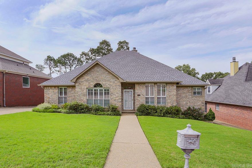 Lovely custom patio home on private cul de sac!  Light, bright and updated eat in kitchen with double ovens, built in microwave, pantry and granite countertops.  Formal dining area open to the great room with vaulted ceilings, stunning hardwood flooring and newer gas log fireplace that circulates heat.  3 Bedrooms and 2 full bathrooms.  Large primary bedroom with new carpeting.  Bonus living area and screened in porch with privacy screen.  Perfect for entertaining.  Loads of storage.  Two car rear loading garage.  Sprinkler system.  Lots of updates including new roof, gutters and windows in 2023.  Fully handicap accessible.  Driveway is not shared.  You don't want to miss this rare opportunity to live on this secluded and charming street close to everything!