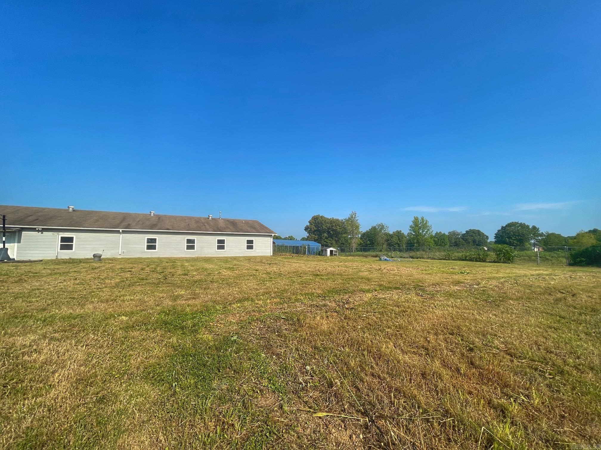 Prime Commercial Property with Scenic & Strategic Location Unlock endless possibilities with this exceptional 37+ acre commercial property in Pottsville, AR. Featuring a 4,000 sq. ft. building, formerly operated as a daycare, this versatile space is ideal for business operations, development, or investment opportunities. The land offers a stunning mix of wooded acreage and cleared pasture, providing both natural beauty and functional use. A picturesque lake on the property adds a unique appeal, offering gorgeous views and potential for unique development. Strategically located adjacent to Pottsville High School and Pottsville Junior High School, this site enjoys high visibility and accessibility, making it an outstanding choice for possible commercial, educational, residential development or community-focused enterprises. With ample space, a prime location, and existing infrastructure from its previous use, this property is a rare opportunity.