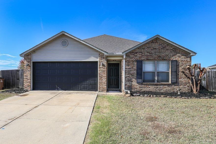 Good as new!  This well-maintained home has brand new carpet and fresh neutral paint throughout! 3 bedrooms 2 baths, with the Primary Bedroom apart!  Primary BR features a beautiful tray ceiling, a large walk-in closet, a soaker tub, walk-in shower, and double vanities!  The eat-in kitchen features a pantry, an electric smooth top stove, a dishwasher, a built-in microwave (replaced 2021), & a side by side refrigerator that stays!  The living room has a vaulted ceiling and comes with a mounted large screened tv!  Nice-sized laundry room!  Large backyard with covered porch and playset!  VIVINT security system STAYS!  2 car garage with auto opener! NOTE:  Bathroom mirrors are missing in pictures but will be hung.  They were taken down for painting.