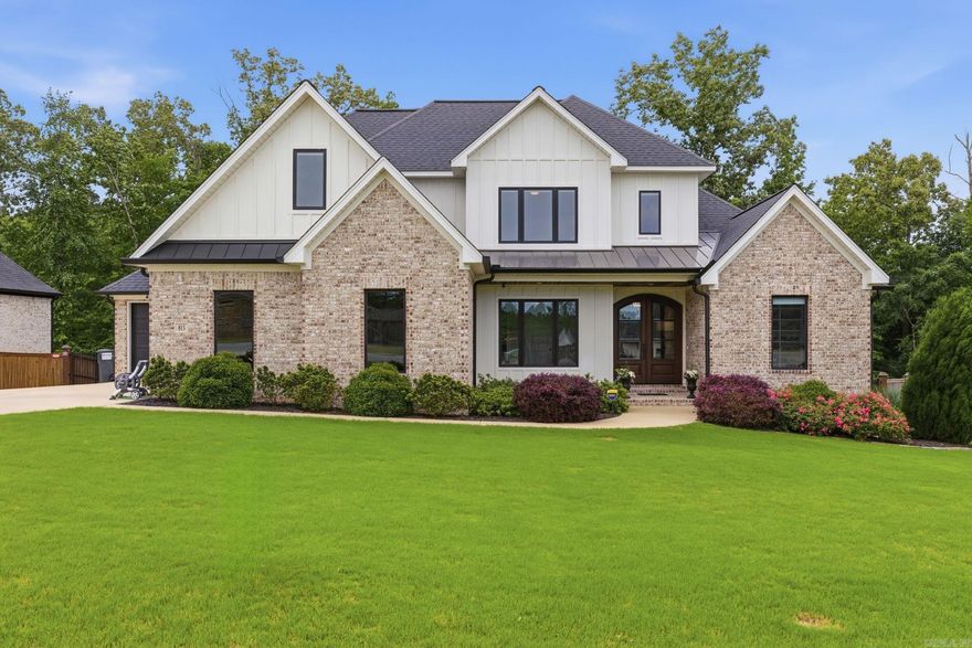 Immaculate and beautifully maintained, this 5 bedroom, 3.5 bath home offers 2,984 sq ft on a spacious .7-acre lot with a fully fenced backyard and woods behind that are part of the property. Inside, you’ll find gorgeous hickory hardwood flooring, crown molding, custom shades, abundant natural light, and thoughtful storage throughout. The kitchen features a huge island, quartzite countertops, induction cooktop, and plenty of workspace for everyday living or entertaining. The dream primary suite includes soaking tub, double vanities, a walk-in shower, and a huge walk-in closet. Oversized guest rooms with walk in closets. Floored attic adds even more storage. Step outside to a large covered patio overlooking a lush lawn with extra landscaping, plus a sprinkler system in both the front and back—perfect for relaxing or entertaining. A 3-car garage includes an extra-long third bay, perfect for a full-size truck or boat. No detail has been spared!