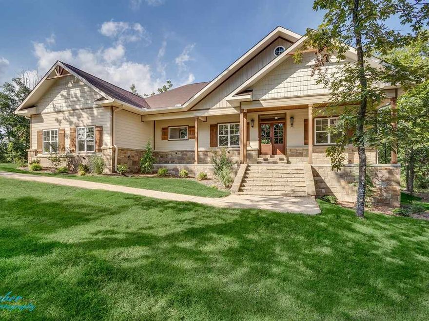 Luxury upgrades and open floor plan welcome you to your new home. Enjoy the peace and tranquility of the country just 5 minutes from shopping and dining. The master chef of the family will love the gourmet kitchen with granite counters, large single basin copper sink and 5 burner gas stove. In the winter you'll always be warmed by the wood burning fireplace with gas starter and spend your summer evenings on the beautiful covered back deck just inviting you to sit awhile. Welcome to your dream home.