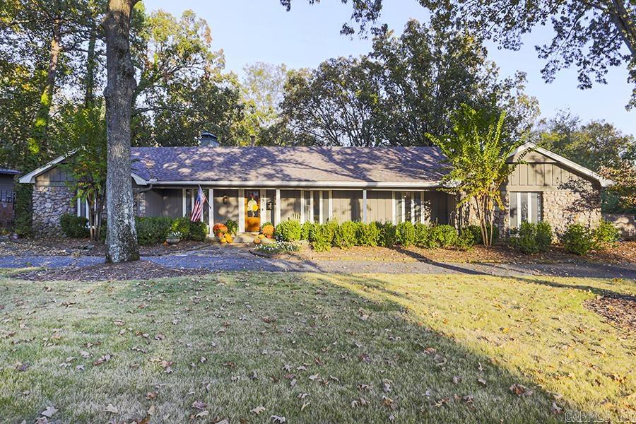 Lovely home in Pleasant Valley within walking distance to the Pleasant Valley County Club. The charming front porch invite you into a fully remodeled gem! the main level features a primary bedroom with a divine ensuite and spacious closets, along with an additional guest room. There's also a formal living area or office, a large den with ample natural light, an open kitchen with access to a new deck for outdoor entertainment, and a separate dining room. On the lower level, there are two large bedrooms, a sizable entertainment space with fire place with a bar and space for full size refrigerator, and an updated bathroom with a double vanity and a walk-in tiled shower. The home offers a great mix of functional and entertaining spaces. Outside, there's a huge backyard with a patio, providing even more options for outdoor activities and relaxation. Overall, a well-designed and comfortable home with both private and social spaces for residents and guests.