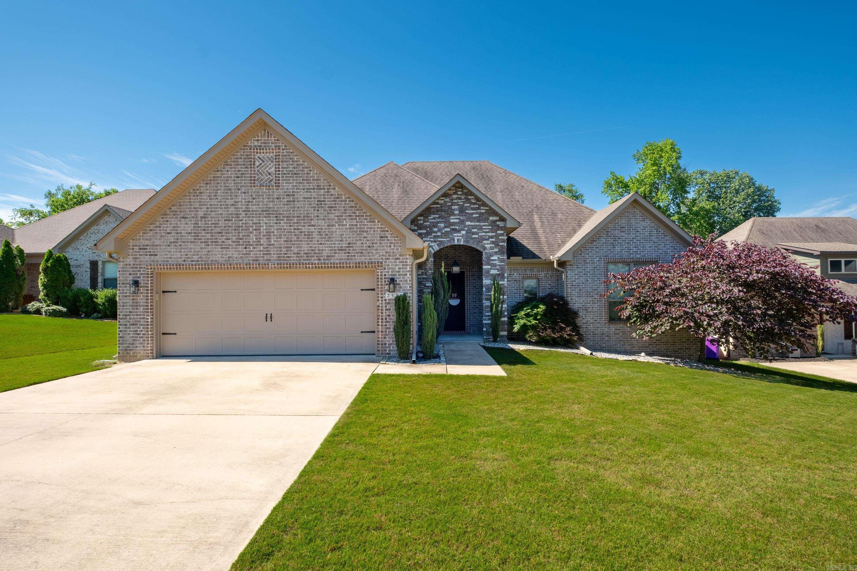 Welcome to 2525 Aberdeen, a beautiful home nestled in the sought-after Harper’s Landing subdivision. This thoughtfully designed home features a charming covered front stoop w/ a stone arch that sets the tone for what’s inside. Step into a spacious foyer that opens into an expansive living room, kitchen, & dining area with hardwood flooring — perfect for entertaining or everyday comfort. The kitchen offers a functional layout w/ a breakfast bar, sleek quartz countertops, a gas cooktop, ample cabinet space, a pantry, & an eat-in area. Lg picture windows flank the fireplace, filling the living space w/ natural light & warmth. The split floor plan provides privacy w/ a spacious primary suite featuring a large en-suite & walk-in closet. At the front of the home, you’ll find a convenient 1/2 bath for guests & a 4th bedroom that can double as an office. On the opposite side are 2 guest bedrooms that share a full bath. Additional highlights include a laundry room w/ folding table & a built-in locker or landing station just inside the garage — ideal for staying organized and keeping clutter at bay. A large, fenced backyard w/ a covered patio & deck for grilling & relaxing.