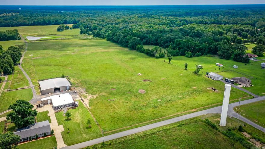 Beautiful pristine and flat land currently being used for cattle. Seller is putting in road from Jones Rd to back of property by pond. Road location notated by pink flags currently. There will be 4-5 3 acre tracts available. Seller has already completed perc test for front lot. Pick your spot and build your dream home. No mobile homes allowed. See agent remarks.