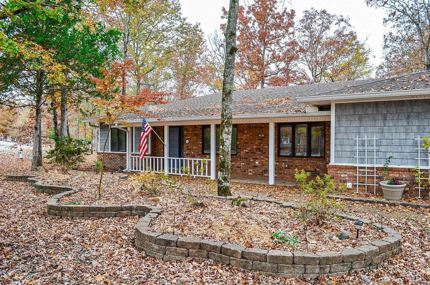 The needle in the haystack......One level Balboa Lake view with common property access home with Arkansas room. Already updated with granite counters , interior paint and luxury vinyl flooring. Great room with fireplace and built-ins. Open floor plan ideal for entertaining or easy living. Very short walk across common property to the water's edge. Kayakers dream. Split bedroom open floor plan located on level corner lot. Roomy double garage with extra workshop/storage area. Hot Springs Village Property Owner Association has a $1500.00 new member buy-in fee collected at closing. No property disclosure is available. This has been investment property.