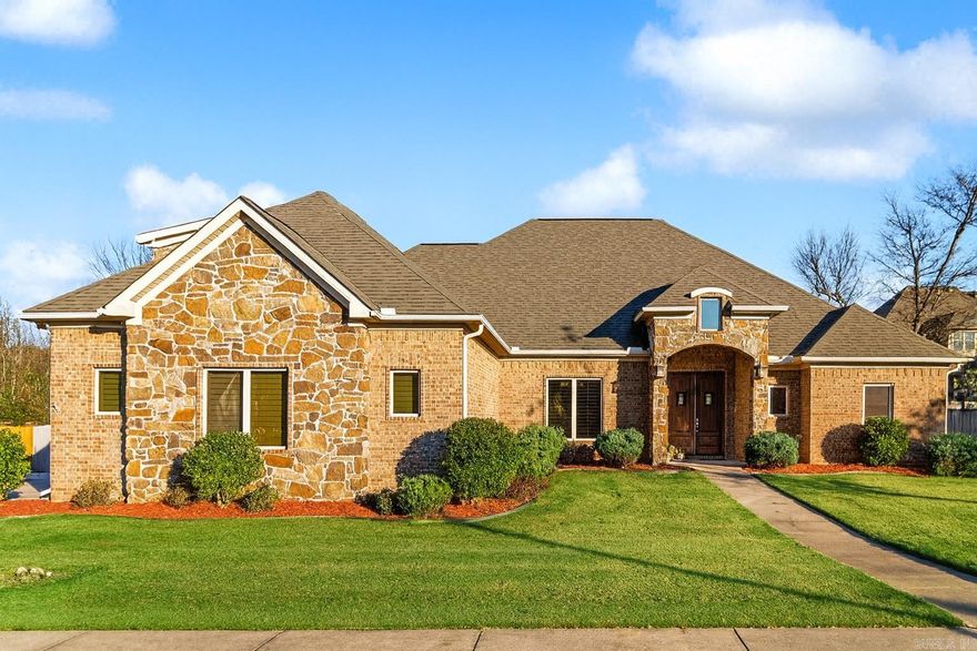 Welcome to this impressive 5-bedroom, 3.5 bath home in Hurricane Lake Estates, offering hardwood floors, generous living spaces, and a layout built for comfort and style. The kitchen features granite countertops, ample cabinetry, double wall ovens and a gas range. The primary suite includes a spacious bedroom, spa-like bathroom with double vanities, walk-in tile shower, soaking tub, and dual closets. Downstairs bedrooms include brand-new LVP flooring (2025), and upstairs offers both a bonus room and a private bedroom with full bath, and new carpet (2025). Enjoy a second living area with fireplace, a well-kept yard, a 3-car garage, and access to Hurricane Lake amenities, tennis courts, pickleball courts, and community pools. Move-in ready and beautifully maintained.