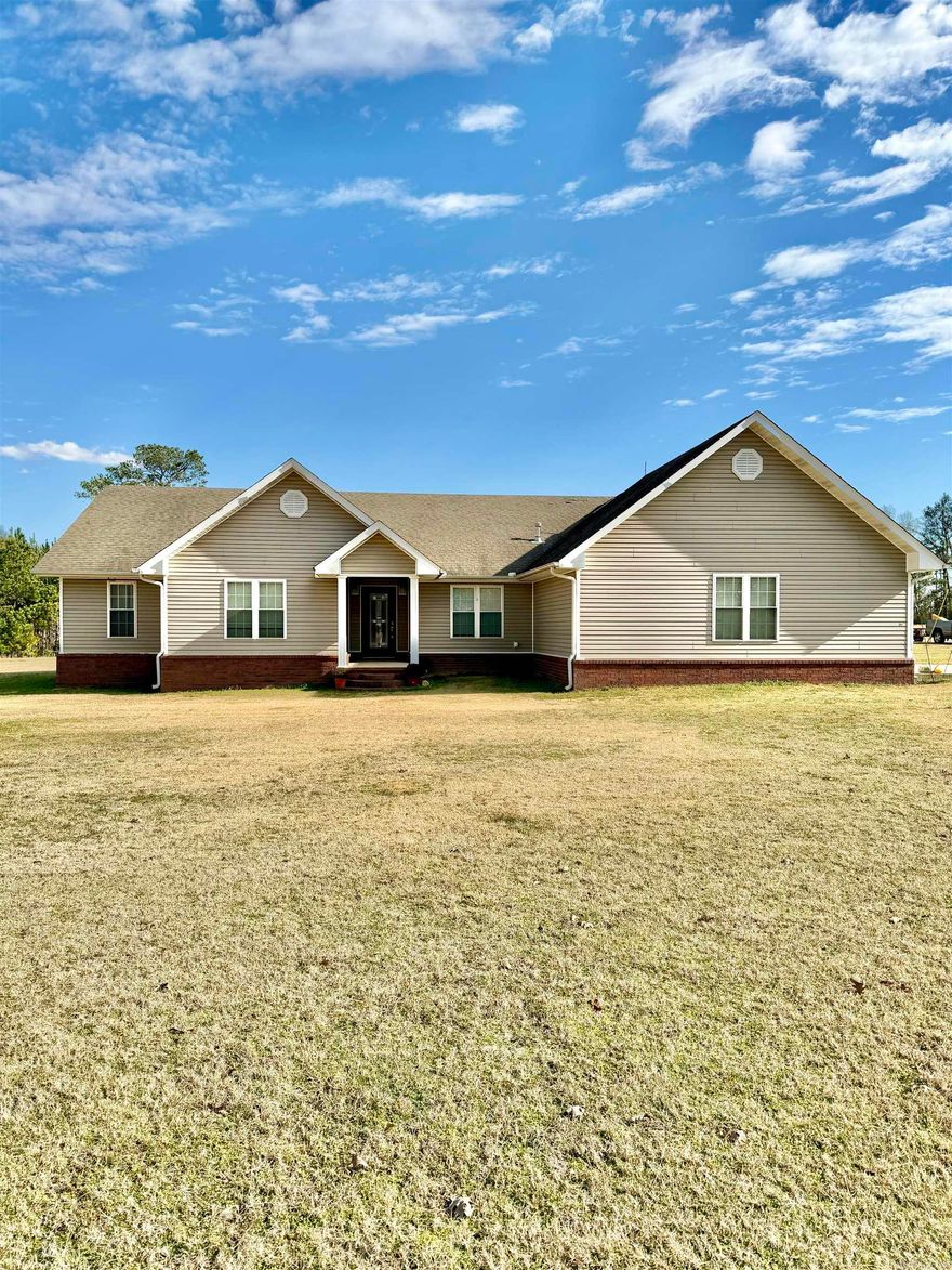 Enjoy peaceful country living on this 9.91± acre property featuring a 2,265 sq ft home built in 2008. The home offers an open-concept kitchen, dining, and family room, 3 bedrooms, 2 full bathrooms, and a dedicated office space.  Outside, the mostly open field/grassland provides plenty of room to roam, along with an above-ground pool, two-car garage, and a detached storage shed for lawn equipment. This property offers the perfect blend of space, comfort, and rural charm with room to grow.