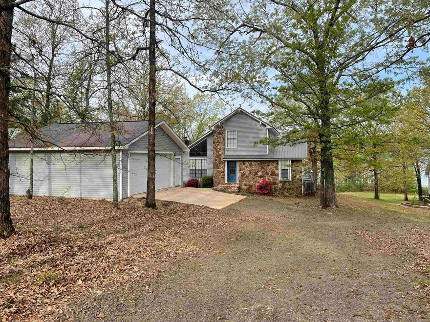 LAKEFRONT!! This beautiful lakefront home located at the North end of the Narrow boast a great view of the lake and Poker Island.  The open floor plan allows for big gatherings.  This house has a wood burning fireplace on the main level. The Master bedroom is located on the main level.  The walkout basement has a game room and one bedroom and one bath.  The upstairs area has a walk out deck and one bathroom.  The property also has a detached two car garage 20 x 24.