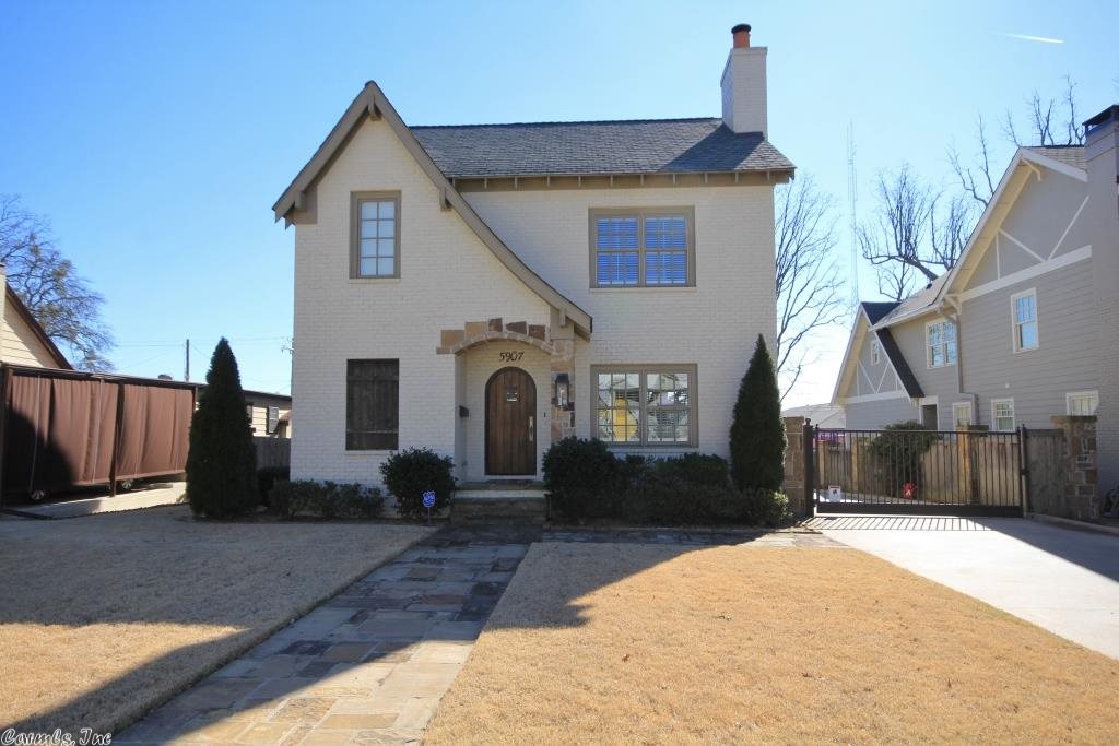 Stunning home with beautiful features. Updated open floor plan with Living room, Kitchen and Dining on main level. Cooks kitchen with chefs range, built-in refrigerator stays, slab counters and island seating. Upstairs has 3 bedrooms plus playroom (this could be 4th). Luxurious master suite with unbelievable finishes. Walk-in closets. Covered porch, two car garage, and yard. Come see! This will not last long.