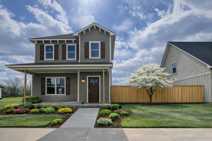 This stunning new construction home in Legacy Farms is nearly complete and move-in ready for its first owners. Designed with upscale finishes and thoughtful details throughout, it features 10’ ceilings on the main level and 9’ ceilings upstairs, creating a bright, open feel.  The kitchen offers quartz countertops, a built-in wall oven, and a spacious pantry, flowing seamlessly into the open-concept living area—perfect for entertaining. The primary suite includes a spa-like bathroom for the owner's retreat.  Built for energy efficiency with 2x6 exterior walls, slab foam insulation, R-21 insulation, a 3-ton HVAC system, and a gas tankless water heater.  Enjoy relaxing on the covered back porch with extra outdoor living space. Located in a convenient subdivision within the Cabot School District, just minutes from town yet tucked away for added privacy. Schedule your showing today!
