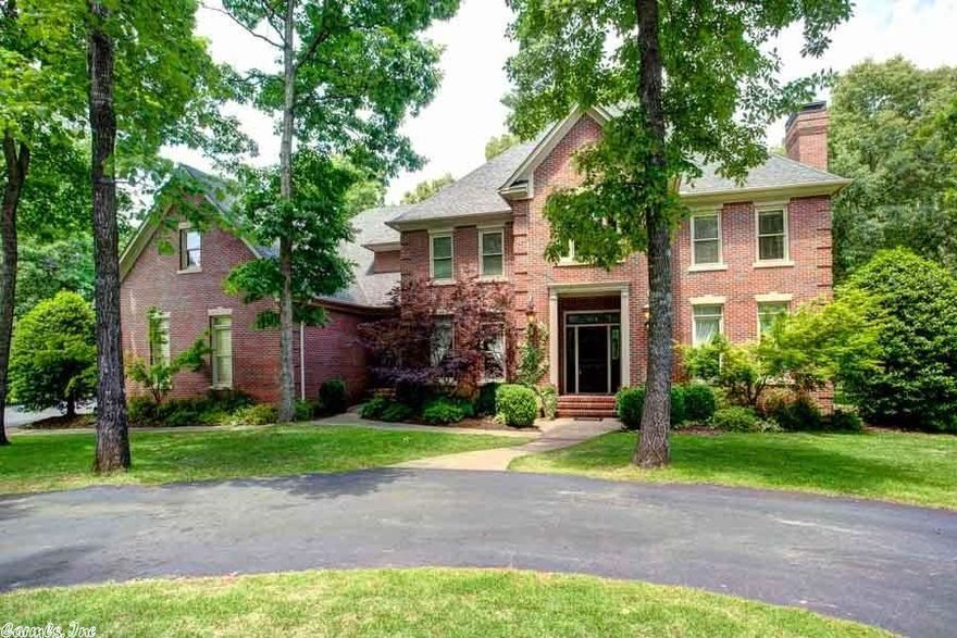 Spectacular Chenal Valley home in beautiful gated Estates.  Handsome two story brick located on large Golf Course Lot.  Immaculate condition inside and out.  Fabulous decor updates.  Gourmet kitchen with quality appliances and breakfast.  Two story foyer with open staircase.  Wonderful formal dining.  Inviting living with FP and large family room with FP.  Outstanding media/playroom.  Security, and sprinkler. 3 car garage. First American Warranty.  Come see!