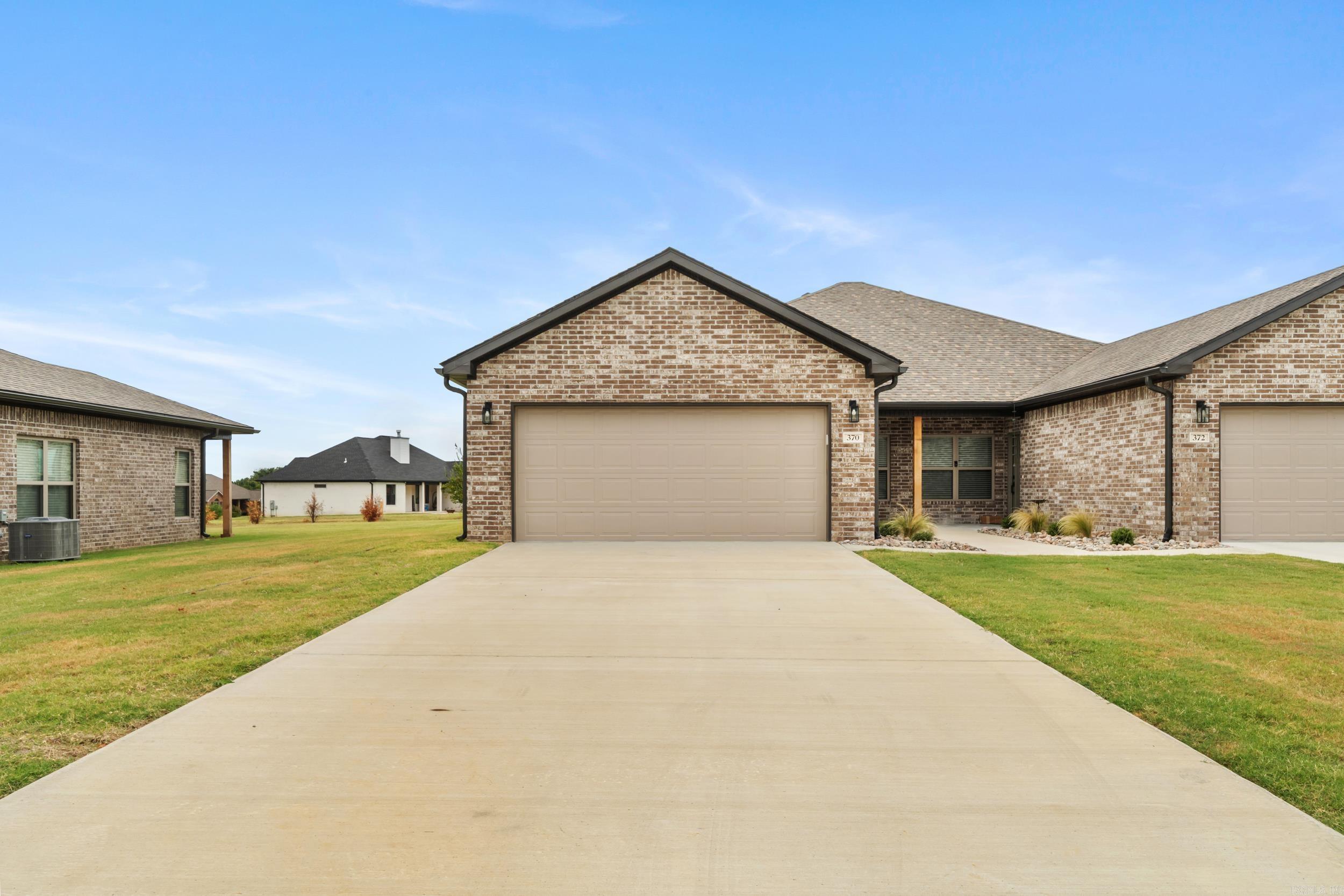 New Construction Patio Homes ā Big Creek Country Club Enjoy low-maintenance, energy-efficient living in this all-brick 2 bedroom, 2 bath patio home with attached 2-car garage. Built with thoughtful design and modern convenience, each plan features open-concept living, dining, and kitchen spaces filled with natural light and contemporary finishes. Interior highlights include luxury vinyl plank flooring throughout, Kemper White Shaker cabinets, 3-foot-wide door openings, lever-style hardware, cabinet pulls, walk-in closets, 2" blinds, and full gutter systems. Stainless steel appliancesādishwasher, range, and microwaveāare included, along with a full-size refrigerator, washer, and dryer. Covered rear patios provide the perfect spot to relax outdoors. Located within the prestigious Big Creek Country Club, these homes combine style, comfort, and convenience in one of Mountain Homeās most desirable neighborhoods.