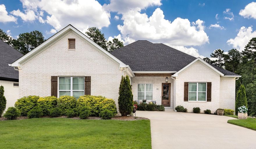 Exquisite detail to design & finishes throughout this beauty. Exterior features include brick, gutters with underground downspouts, keyless entry at garage, welcoming covered front porch with wood paneled ceiling, sprinkler system, privacy fence, canned lights at soffit, garage storage & full walk up to floored attic. Family size central living area combine Kit., Dining & Living. Oversized laundry boasts sink, hanging bar, quarts counter top & tons of custom storage.  4 bay mud area with coat closet at garage entry, additional coat closet at front entry. Gourmet kitchen continues the craftsmen decor with 5 burner gas cooktop, frig, dishwasher, built in microwave, convection oven, walk in pantry, large central island with breakfast bar & farm size sink. All living areas come together under a 2 story, cathedral, wood beamed ceiling throughout the rest of the home you will find 12' ceilings, 8' solid doors, hand scraped wide plank flooring, designer ceramic tile in all wet areas, subway tile at back splashes, quartz counter tops on all vanities as well as the appliance station in the walk in pantry.  6" baseboards, crown molding & framed windows & doorways complete the craftsmen decor