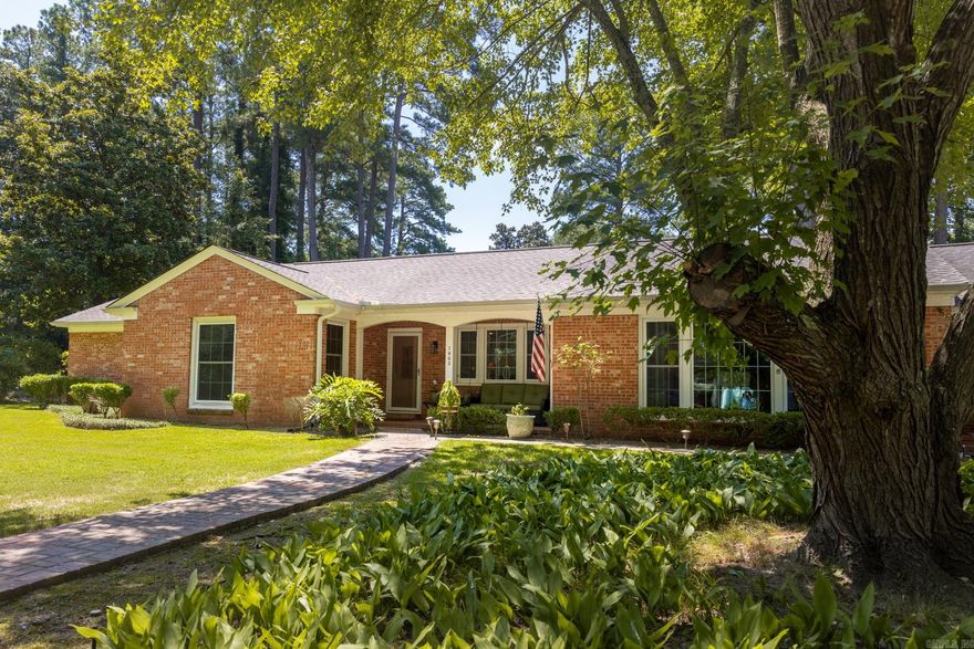 Beautiful totally remodeled, well taken care of home in the highly desired Pineview Addition Subdivision. Location is everything! Lot is very large with gorgeous landscaping! Neighborhood is quiet but close to the action! Home has large spacious rooms with engineered hardwood floors in living space, tile in baths, brick entry and sunroom, carpet in bedrooms. Kitchen has granite Countertops, painted cabinets, Gas Range, under cabinet lighting, a Barista Bar, a unique working Vintage indoor grill, updated GFCIs and 2022 new faucets for both the wet bar and kitchen sink!!!! Peaceful sunroom off of master suite will invite you to prioritize some R and R, read a book or snuggle in for a nap! Retreat to the huge and very lovely backyard with a new side yard culvert in 2023. All closets have automatic lights, on and off when doors open & close! NEW windows in 2018 with Lifetime Warranty! Two NEW hot water tanks in 2021! HVAC new inside components in 2022! New outdoor motion lights in 2021. Garage and attic space have updated new outlets and light switches, 2020. You won't want to miss this treasure! Book your appointment today! (measuring is encouraged, agent please see showing remarks)