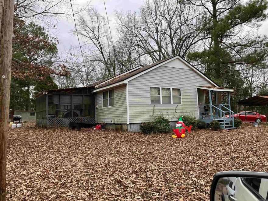 9 acre tract with one house and 6 duplexes on the property