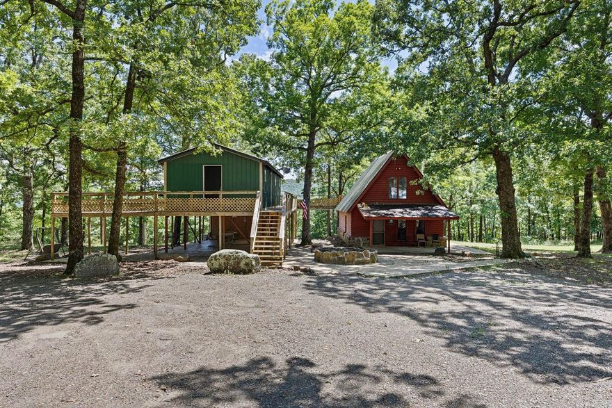 A Lucrative Retreat on 17+ Acres Adjacent to National Forest  Discover the perfect investment opportunity with this versatile 17+ acre property next to over a million acres of National Forest. Featuring an A-frame cabin and a secondary guest cabin, it's ideal for vacation rentals, retreats, or events.  A-Frame Cabin: The bright, open-concept living space offers high ceilings and large windows that flood the home with natural light. A cozy living room, spacious dining area, and modern kitchen lead to a loft with stunning forest views.  Secondary Cabin: With two bedrooms, two bathrooms, and a welcoming living space, it’s perfect for hosting guests.  Both cabins have city water and Wi-Fi, with direct access to trails for hiking, biking, and more.  Don't miss this rare opportunity—schedule a viewing today!