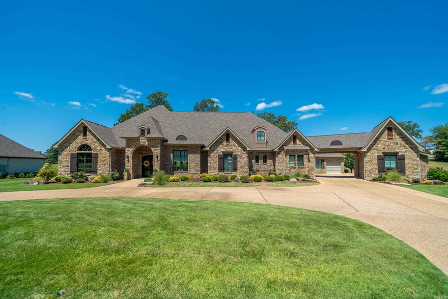 This stunning 5- bedroom, 5.5- bath estate located in the prestigious Arlington Park Neighborhood. Situated on a golf course view lot, this home offers the perfect blend of elegance, comfort, and resort-style amenities. Spacious main residence with open living spaces and luxury finishes. Features a pool, multiple outdoor living areas, office with custom built-ins, large bonus room, full house generator, 5- car garage (one is heated and cooled for temperature control), an additional 1200 sq ft mother-in-law quarters complete with kitchen, living room, bed and bath, and breath taking views of Hot Springs Country Club from your backyard. This property is one of a kind.