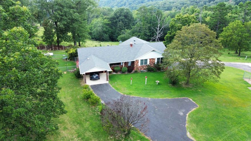 49 ACRES +/-, LOCATED ON HWY 58 IN MELBOURNE ARKANSAS, WITHIN 6.2 MILES OF THE FAMOUS WHITE RIVER IN GUION.  This beautiful country home comes with 49 acres of land, perfect for cattle and hunting. Nestled amidst the beautiful Arkansas Ozark Mountains, this property offers a 2322 sq ft home, all heated and cooled, with 3 bedrooms, 3 bathrooms, basement and much more!! The home is handicap accessible, ensuring comfort and convenience for all residents. This home features a spacious and well-designed layout, with plenty of additional space, perfect for all your hobbies. Additionally, the home boasts an additional room that's perfect for relaxation. You'll love the beautiful exterior, with the beauty of the Ozark Mountains at your back door. The land surrounding the home is fully fenced. Furthermore, the roof has been recently replaced and is only 6 years old. Whether you are looking to indulge in a peaceful country lifestyle, this Hwy 58 property has it all. Immerse yourself in the beauty of nature, enjoy the breathtaking views, and savor the comfort of a well-maintained home. Don't miss this chance to own your slice of paradise in Melbourne, AR. Listed for $359,900!