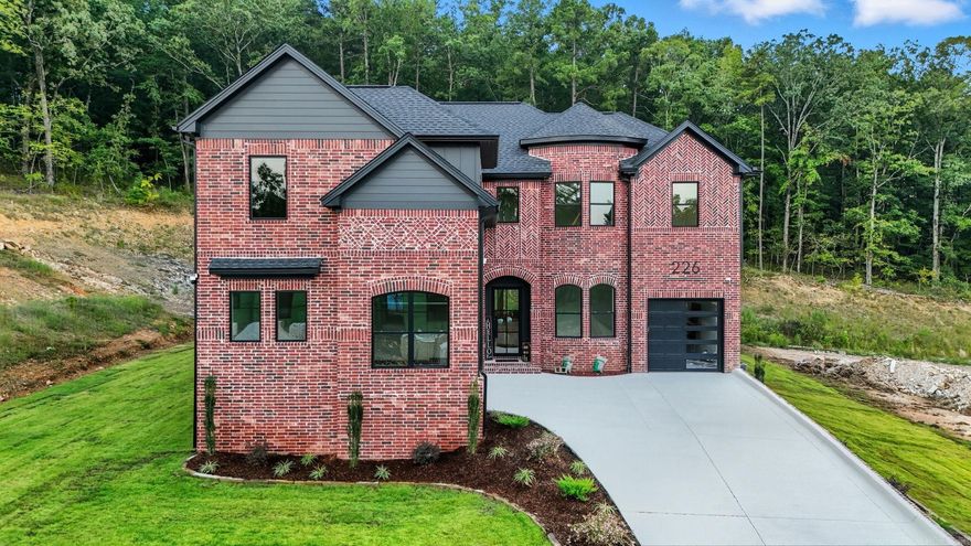 Welcome to 226 Abington Circle, where design meets luxury living in the heart of Chenal Valley. This 5-bedroom, 4-bath home is crafted for both comfort and style, featuring an open-concept layout, soaring windows, a loft retreat, private office, media room, and a butler’s kitchen built for effortless entertaining. Every detail blends elegance and functionality, from the rich brick exterior to the thoughtful flow of the interiors.  Located in the Abington Court subdivision, the community offers amenities including a pool, playground, picnic areas, and walking/bike trails all within a beautifully maintained neighborhood with landscaped common areas and underground utilities. Just minutes away, residents have convenient access to The Promenade at Chenal, featuring premier shopping, dining, and entertainment, along with quick connections to Chenal Parkway and Cantrell Road.  This home offers the perfect balance of luxury, convenience, and community.
