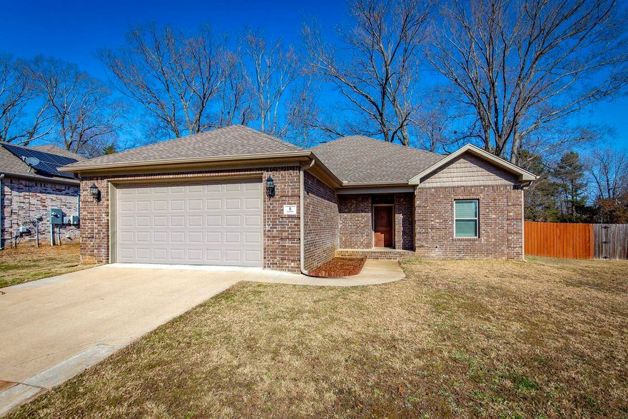 Welcome to this charming 4-bedroom, 2-bathroom home, ideally located in the heart of Cabot on a quiet, peaceful street. Featuring a spacious open floor plan, this home offers comfortable living with ample room to relax and entertain. The kitchen is a standout, complete with beautiful granite countertops, sleek stainless steel appliances, and a cozy eat-in area perfect for casual meals.  Enjoy the privacy and security of a fully fenced yard, complete with a privacy fence, offering a great space for outdoor activities and gatherings. The two-car garage adds convenience and extra storage space.  This home is the perfect blend of comfort, style, and functionality, all while being centrally located for easy access to local amenities, schools, and more. Don’t miss your chance to make this beautiful property your own! Call your favorite realtor today!