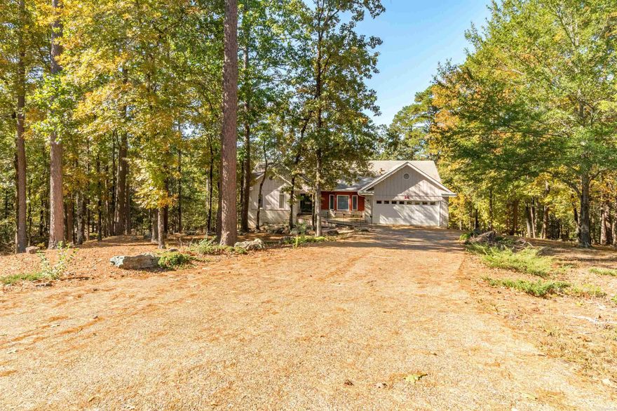 Nestled in the coveted Balboa Lake neighborhood, this well maintained 3-bedroom, 2.5-bath home offers approximately 2,300 heated and cooled square feet, including a sunroom that invites natural light and relaxation. Thoughtfully designed for privacy, the split-bedroom layout compliments soaring vaulted ceilings and a cozy gas fireplace that anchor the spacious living area. The formal dining room pairs perfectly with the eat-in kitchen, which features generous cabinetry and includes a refrigerator for move-in ease. A large laundry room—complete with washer and dryer—adds everyday convenience, while the primary suite provides a true retreat with its walk-in closet, dual lavatories, and walk-in shower. Additional highlights include an attached two-car garage and a workshop/storage space in the crawl area, offering functional versatility for hobbyists or extra belongings. This elegant one-level home seamlessly blends comfort and practicality.