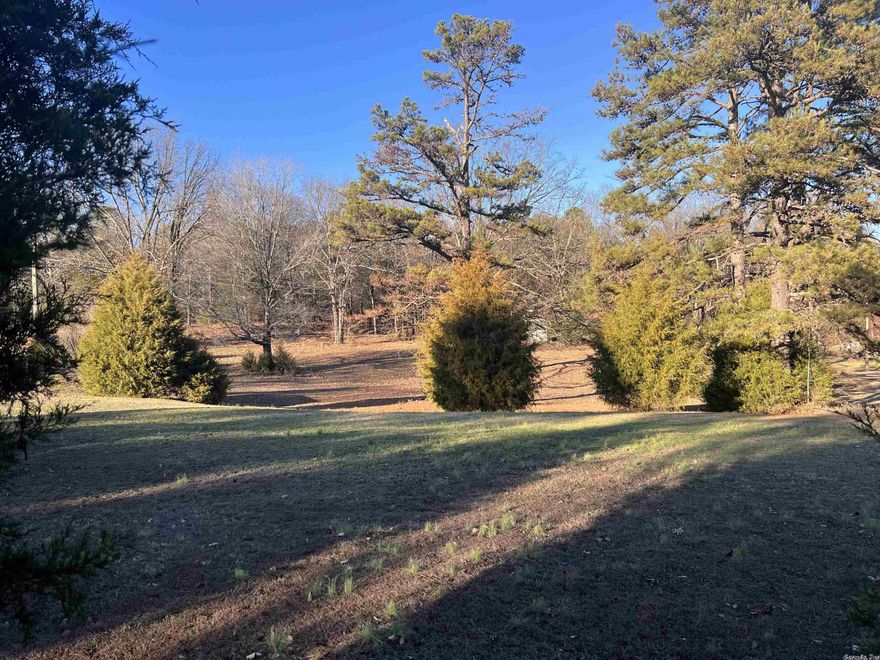 Opportunity to own at least 1 acre in town with many possibilities on road with no-thru traffic.  There is a storm shelter on the property.