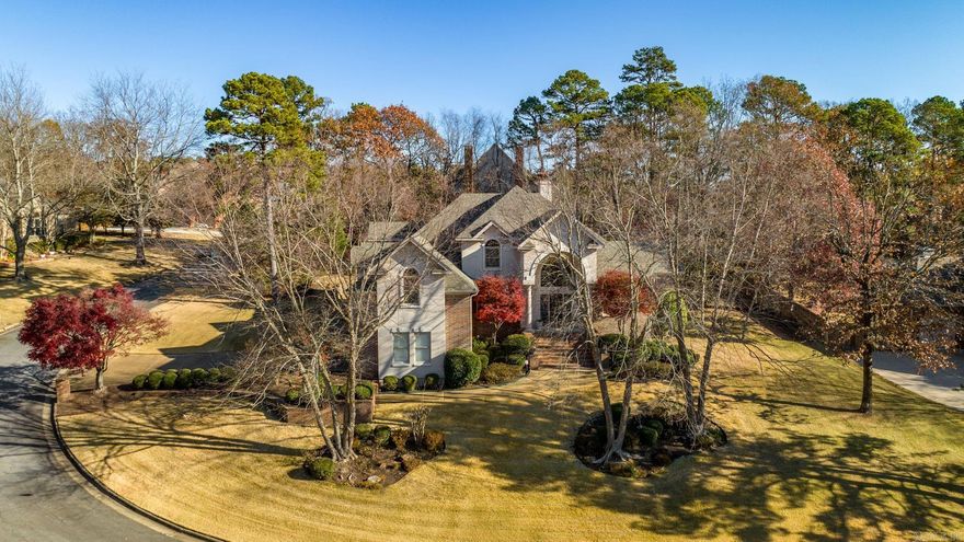 Spectacular Chenal Valley home on beautiful corner lot.  Handsome street appeal and fabulous floor plan combine to create the ultimate home for family living and entertaining. Gorgeous decor' including site laid hardwoods. Elegant two-story entry with open staircase flanked by banquet dining and inviting study. Large family room with fireplace and built-ins adjacent renovated kitchen with sunny keeping room and breakfast area. Luxurious primary suite located on the main level. Upper level consists of 2 large guest bedrooms with bath and additional spacious game room/4th bedroom or home office. New roof 2023, 3 car side load garage with storage. Custom designed landscape along with private deck and patio terrace.  A must See!