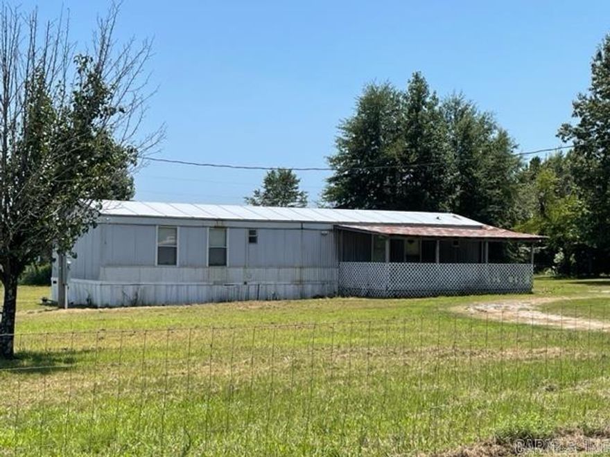 Singlewide 3 bed 2 bath home on 3.73 acres.