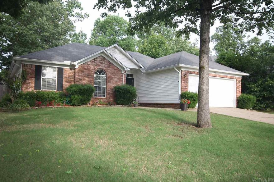 Beautiful three bedroom and two bath home in West Little Rock. Vaulted ceiling in living area with a gas fireplace. Wood and tile floors throughout. Kitchen features new counter tops, sink, and cooktop in 2011. New fixtures throughout were added in 2011. Lots of storage with a partially floored attic that was added in 2009.  Fully fenced level backyard with extra landscaping and patio. Schedule a showing today!