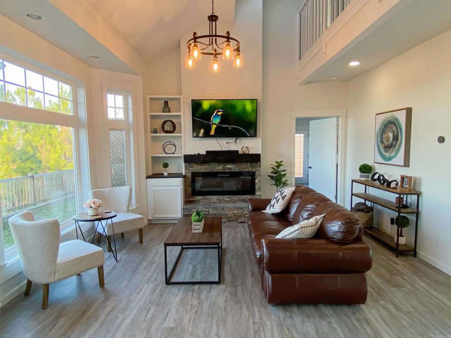 Escape to the mountains in this stunning 3-bedroom, 2.5-bath fully furnished retreat, currently operating as a successful Airbnb! Perched on 3.25 private acres in the heart of the countryside, this spacious home boasts breathtaking vista views and is located in an exceptional school district.  Inside, you’ll find soaring cathedral ceilings, expansive skylights that flood the home with natural light, a custom fireplace, and a cozy reading nook/office perfect for working remotely or unwinding with a book. The thoughtfully designed layout includes a bonus/game room, ideal for entertaining guests or creating a fun family space.  With tons of storage, a 2-car garage, and an additional carport, this property offers all the space you need for mountain living. Whether you're looking for a permanent home, vacation getaway, or turnkey investment property, this mountain gem has it all!