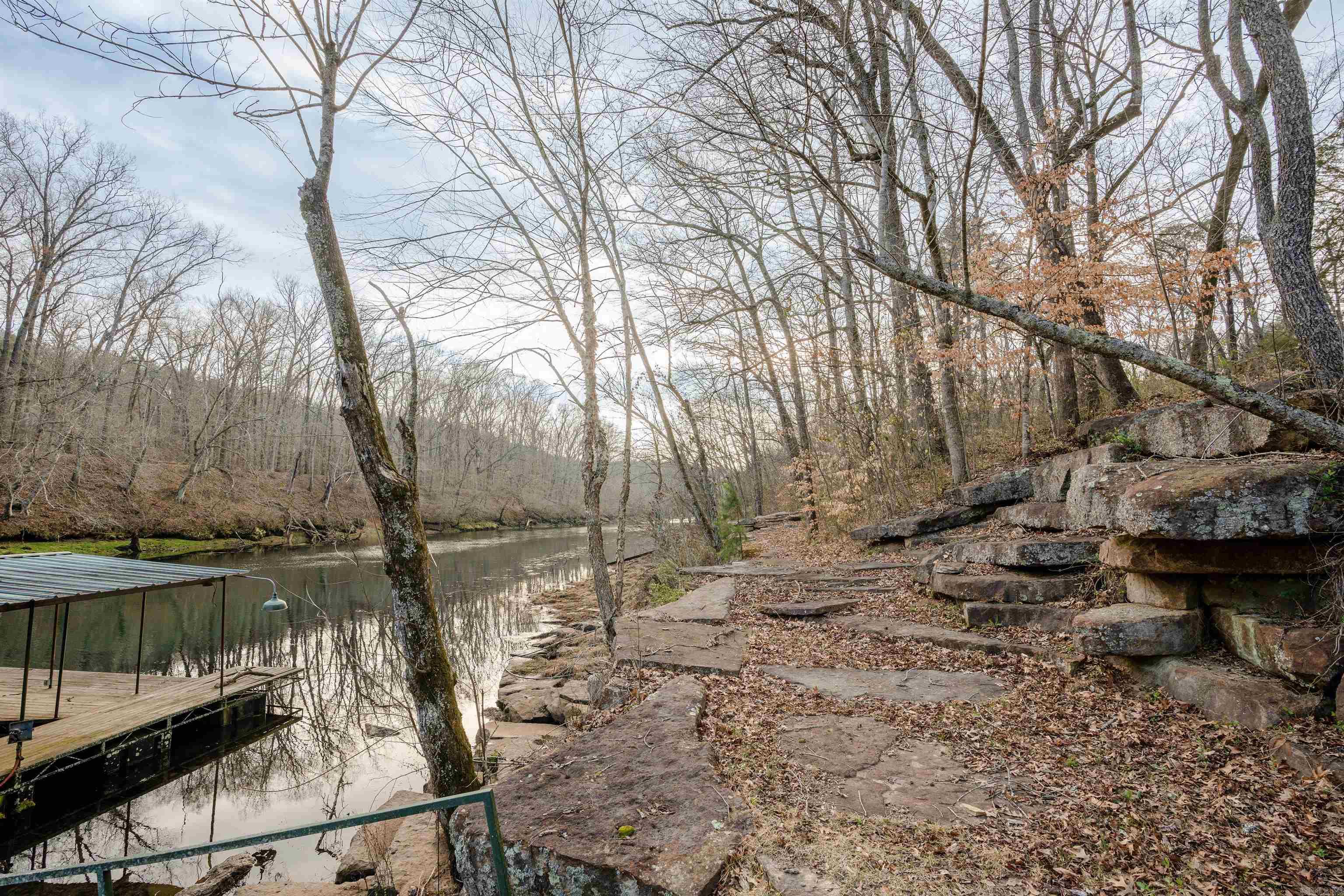 The most secluded property on the Little Red River! This 30.47 acre parcel includes a rustic cabin, two boat docs and extensive river bank restoration by Farris and Sons. Development possibilities include a resort, subdivision, or the best single family residence on the river. A stunning place!