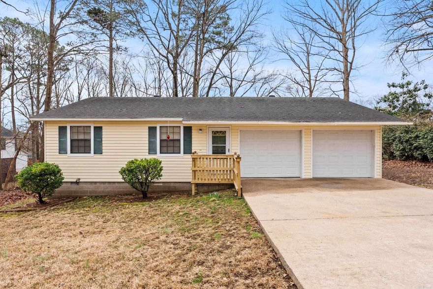Discover this delightful 3-bedroom, 2-bathroom home located in the heart of Benton.  This cozy quiet neighborhood in tucked in among shade trees perfect for backyard entertaining featuring a new fence for added privacy. The home boasts new updated fixtures and dishwasher. The spacious living room is perfect for relaxing. The home includes a 2 car garage providing ample parking or storage space. Nestled in a peaceful community, this home offers the ideal blend of comfort and tranquility.  Don't miss this opportunity to make this charming property your own! The small white shed in the back stays.
