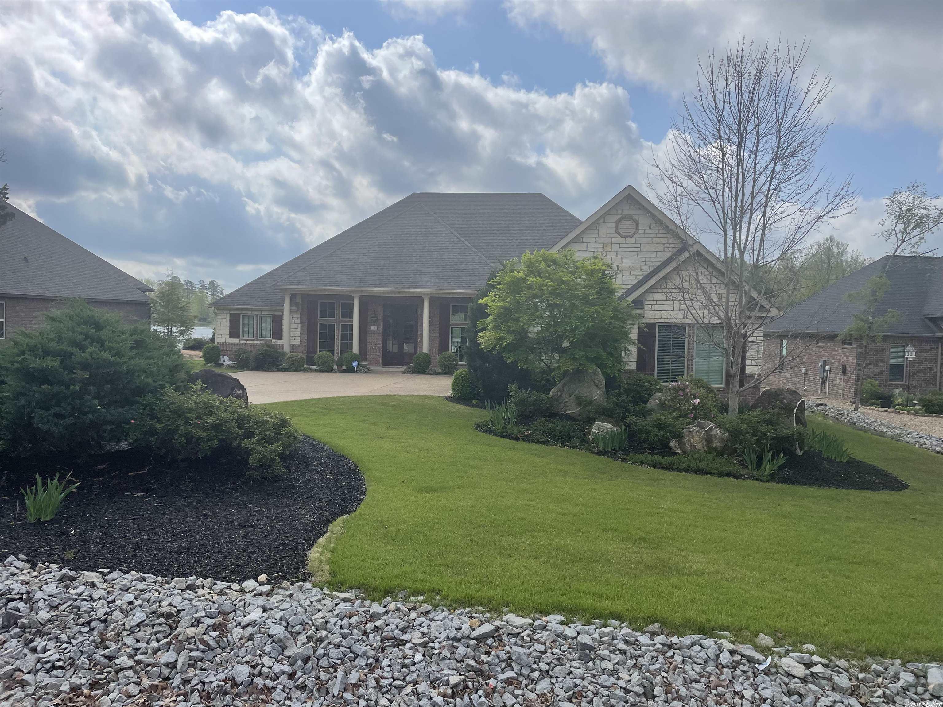 Enjoy this spectacular view from so many places inside and out. Entertain in this spacious kitchen that overflows into the spacious family room. Barrel entry, hardwood floors to enjoy. Large closets, great pantry, perfect for entertaining. Permanent stairs to attic in garage with flooring.