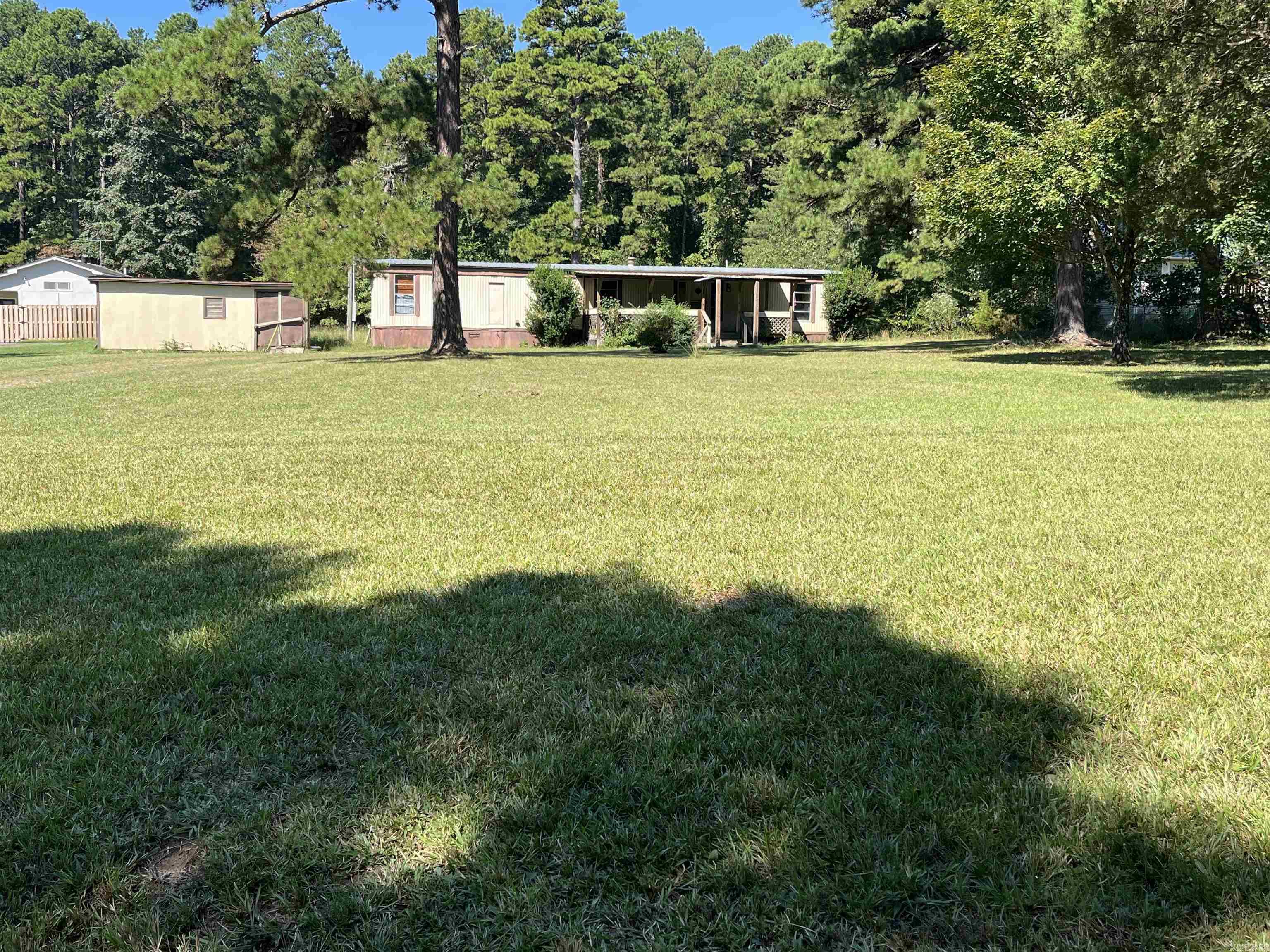 Grab up this property before it is gone!! Has a fixer upper mobile on the property with an additional 11.32 acres out back for a total of 12.30 acres in Tortoise Bay Subdivision! The back 11.32 acres do not have restrictions! Call us today!