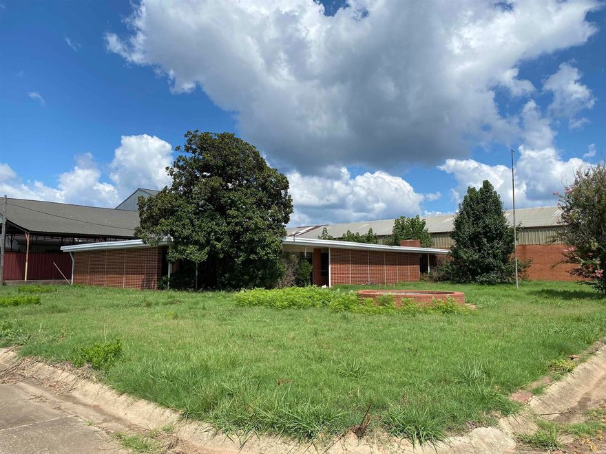 Ideally located between Clarksville and Lamar and outside the city limits, this property is prime for development!! Formally known as Acme Brick plant this 17-acre property is fully fenced and is ready for its new owner! It features may buildings that span 158,000 sq ft. a loading dock, offices, large parking lot and so much more! This property has a new survey too. Call today to schedule your showing