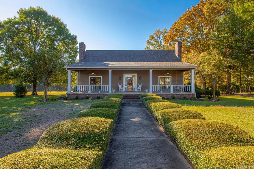 Welcome to your private retreat in the heart of Grant County! This beautiful custom built home sits on five and a half acres with an additional 6.38 acres available for those looking to expand their homestead, hobby farm, or recreational space.  From the moment you pull in the circle drive, you'll feel at home among the mature trees, manicured hedges, & inviting from porch- the perfect place to enjoy quiet mornings or evening sunsets. Step inside to find spacious living area with fireplace, rich wood trim, and quality craftsmanship throughout.  Nice kitchen featuring ample counter and cabinet space & a large breakfast area that overlooks the yard.  There is a beautifully welcoming foyer with staircase leading to the very large bedrooms and bathrooms. Downstairs is the oversized primary bedroom with gas fireplace and bathroom.  Outdoors, the property shines with a large barn with 4 stalls and tack room.  Plenty of room outside for a garden, horses etc. or simply enjoy the space and privacy.  Don't forget the spacious carport, separate office space and shop that make this property stand out above the rest.     Roof 2025, Shop has concrete floor, electricity & wood stove...