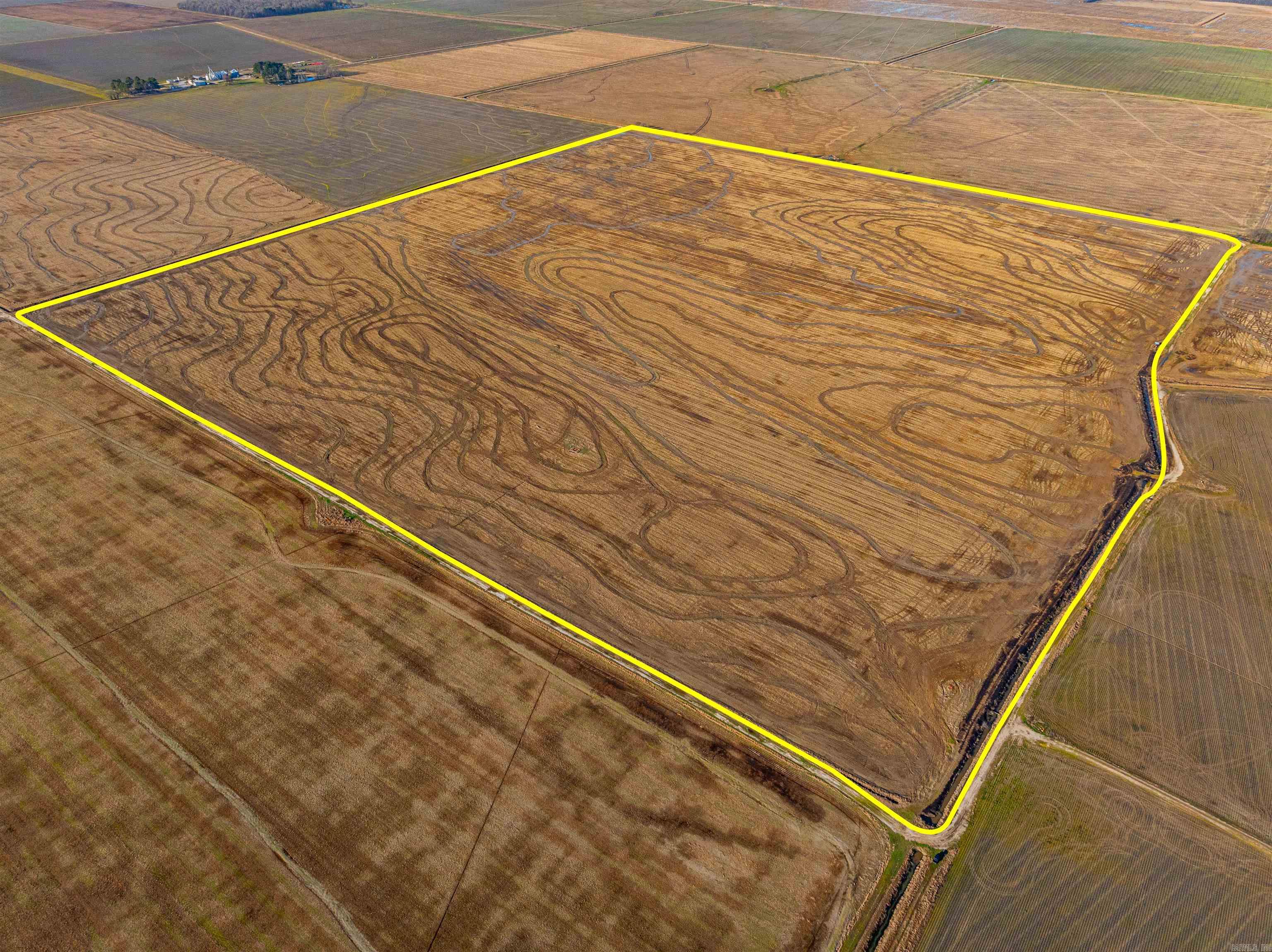 Excellent Row Crop Property, 179 +/- Acres, Grand Prairie, white dirt, 4 risers, capable of growing any crop, irrigation well, the road entirely around it makes for easy access. No trees on the property make it easy to spray and fertilize fields. Â For the hunters, this property is 3 miles north of Coca-Cola Woods, north of Fair Oaks, 1 mile from Bayou Deview, and directly in the middle of the Duck and Goose Flyway! Â It is an excellent location if you live in the city and need a place to hunt; it is just 60 miles from Memphis, easy to get to. Â For the hunter who needs a little income, this farm currently has a shared split with the farmer, and the farm is scheduled to have 1/2 rice and 1/2 beans for the 2024 season. Â With all this, wanting a row crop farm with hunting potential would be excellent!