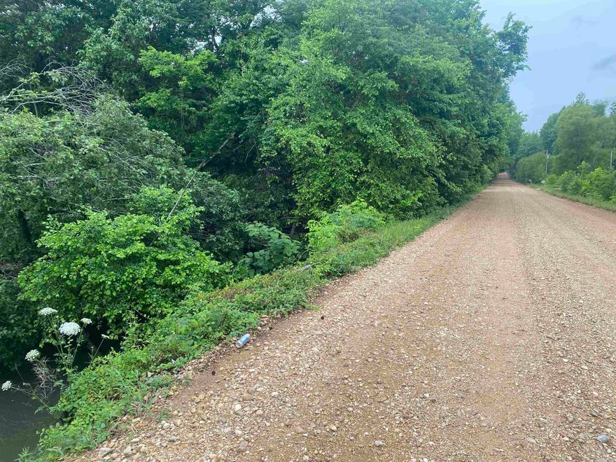 Lot 1 of 4. 10 Acres of wooded land, would be a great location to build your new home, This place is loaded with deer and turkey!  It has two creeks on the property and Big creek runs from Lake Frierson, causing it to be filled with fish as well! Seller has 40 acres total for sale in multiple tracts!