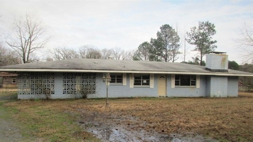 Don't miss this home!!  This home sits on approximately 1.14 acres, fenced backyard with storage building and log storage/studio.  This home has 2 living areas, 2 bedrooms and 2 baths.  Call me today for your personal tour!!  Taxes are after Homestead Credit**  Property was built prior to 1978 and lead based paint potentially exists. **Agents see remarks**