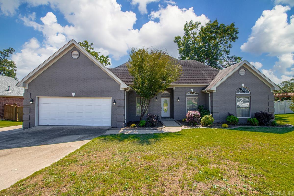 Charming 5-Bedroom, 2-Bath Home in Prestigious Longhills Subdivision. Welcome to your dream home in the highly sought-after Longhills subdivision. Fresh exterior paint, new bedding plants out front, and a new stove. Access to the exclusive Longhills golf course, this home offers both serenity and convenience. The expansive backyard is a family’s delight, featuring a children’s playground perfect for endless hours of fun and relaxation. Inside, you’ll find a thoughtful layout designed for both entertaining and everyday living. The separate dining room is ideal for hosting gatherings, while the additional kitchen dining area provides a cozy space for casual meals. With ample living space and generous bedrooms, this home effortlessly accommodates families of all sizes. Central vacuum makes clean up easy. Don’t miss the opportunity to own a piece of Longhills’ charm in a vibrant community with biking trails and is known for its scenic beauty and recreational amenities. Schedule a showing today and discover the perfect blend of style and comfort. Buyer to choose shingle color with an accepted offer and will be replaced before closing.