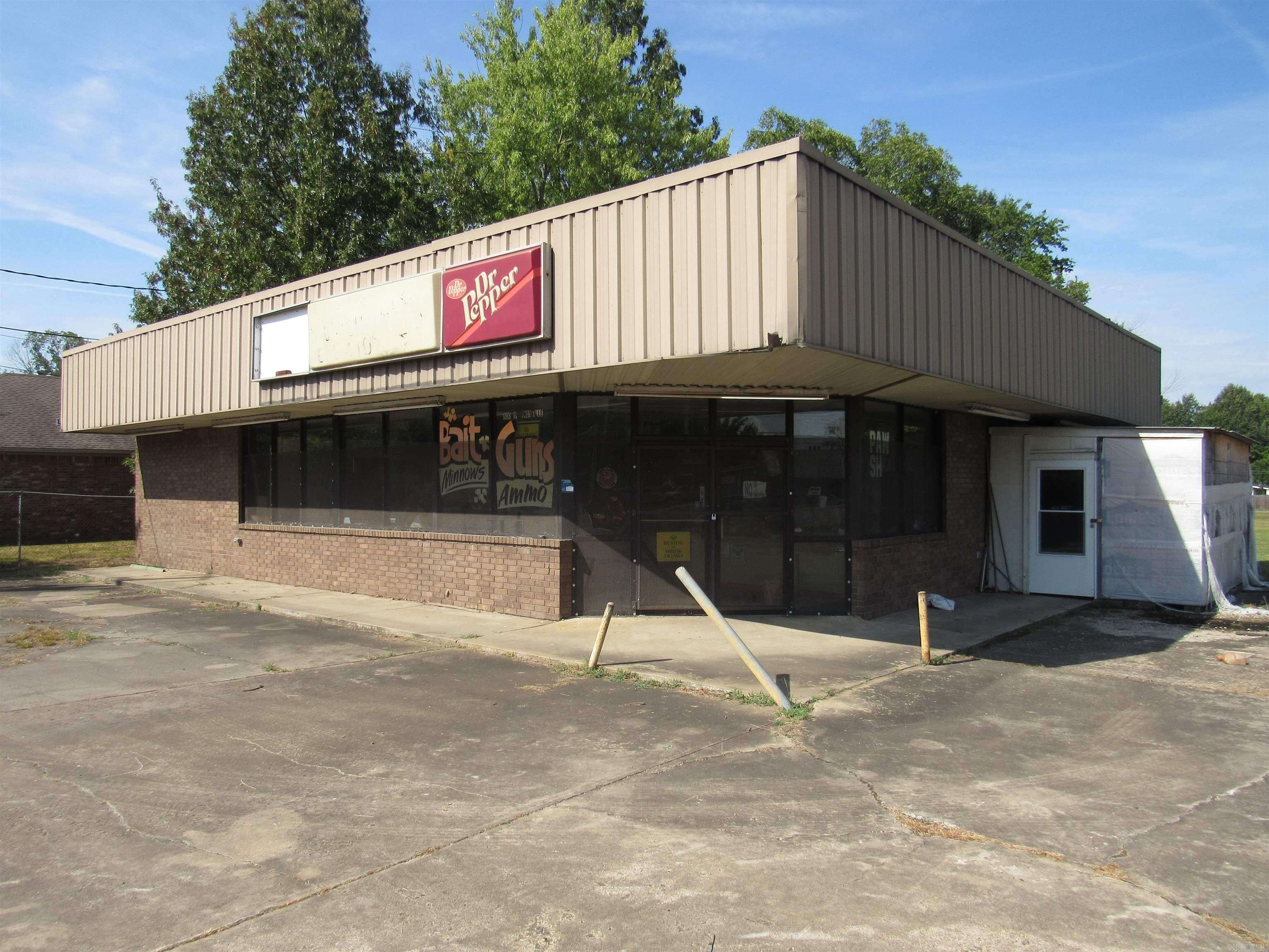 Previously operated as a Convenience Store, Gasoline Station, Sportsman's Shop, Bait Store and Pawn Shop. This property is located across from the County Fair Grounds with lots of residential dwellings in the immediate area.