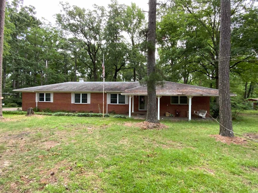 Nice brick home outside city limits with acres. Refrigerator and gas stove belongs to renter.
