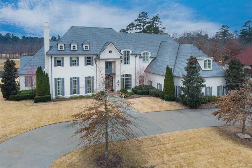 Timeless, Hartsell built showcase! .64 acre golf course, pond, level lot. Outdoor entertaining- salt water pool and covered veranda. Soaring ceilings w/antique beams, wide plank hardwoods, versatile 6th bedroom library, 5 fireplaces, 2 laundry rooms, dual staircases, butlers pantry and mud room. Gourmet kitchen- Sub-zero, Viking gas, marble counter tops. Large BRs with ensuite full baths, media room and loft/den. New Orleans fixtures, slate roof. Featured in many national publications. Entertainer's dream!