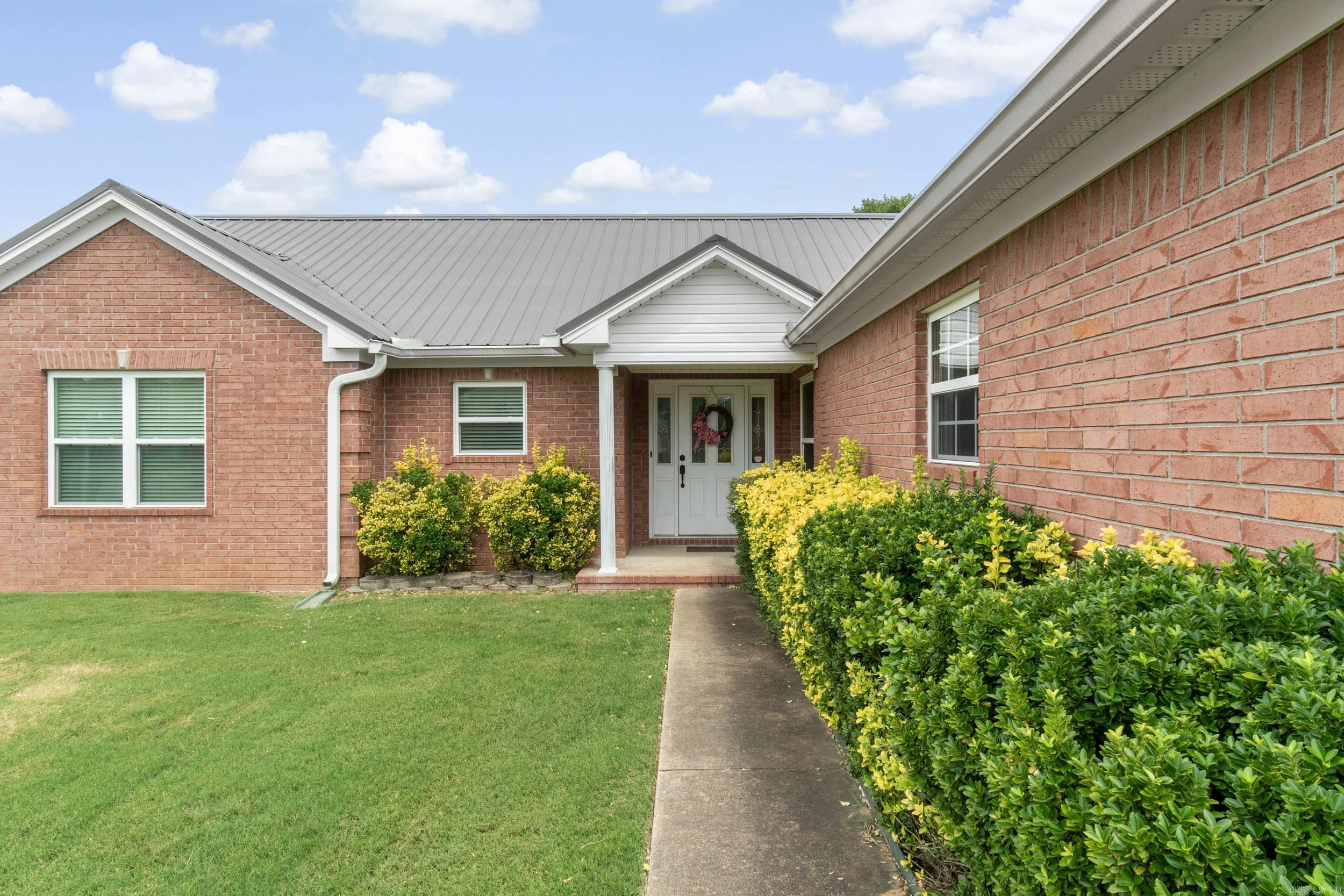 Welcome to your new home! This spacious 3 bedroom, 2 bath residence offers 1,834 square feet of comfortable living space with a desirable split floor plan. Located in one of Searcy's most desirable neighborhoods, this home features a storm shelter in the garage for added peace of mind. Weather you're relaxing in the cozy living areas or enjoying the privacy of the primary suite, this home has everything you need and more. Washer, dryer and refrigerator and trash compactor convey with the property. A few other particulars: Metal roof 4 yrs old, energy efficient windows installed 3 and a half yrs ago, HVAC installed 2 yrs ago and regularly serviced every 6 months, new gutters and leaf filters, all adds to peace of mind. Don't miss this well-maintained property and your opportunity to call it home! Call today!